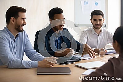 Happy african american businessman holding negotiations meeting. Stock Photo