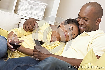 Happy African American Couple Drinking Wine Stock Photo