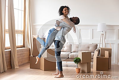 Happy african couple first time home buyers celebrate moving day Stock Photo