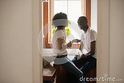 Happy african american family couple doing morning hygiene routine together. Stock Photo
