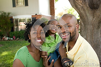 Happy African American family with their baby. Stock Photo