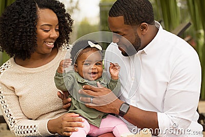 Happy African American family with their baby. Stock Photo