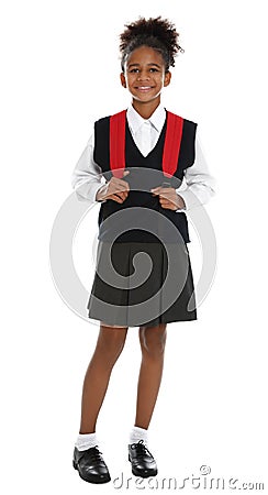 Happy African-American girl in school uniform on white Stock Photo