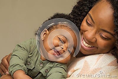 Happy African American mother and her daugher. Stock Photo