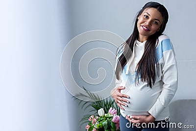 happy african american pregnant woman Stock Photo