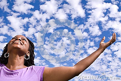 Happy African American woman with open arms. Stock Photo