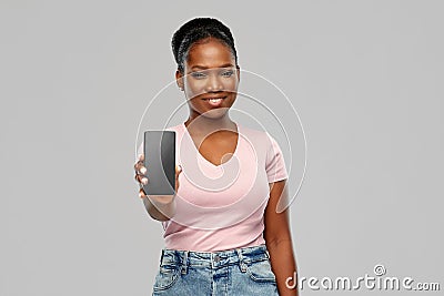 Happy african american woman using smartphone Stock Photo