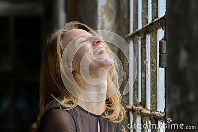 Happy amused young woman enjoying a good laugh Stock Photo