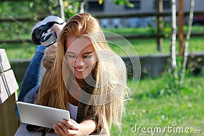 Happy amused young woman with a vivacious smile Stock Photo