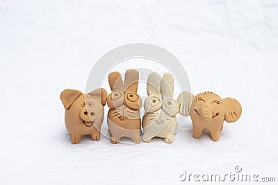 Happy animal sculpture isolate on white background, happy animal clay design Stock Photo