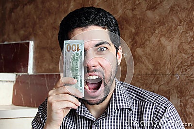 Happy arab businessman with money Stock Photo
