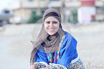 Happy arab muslim woman wearing hijab Stock Photo