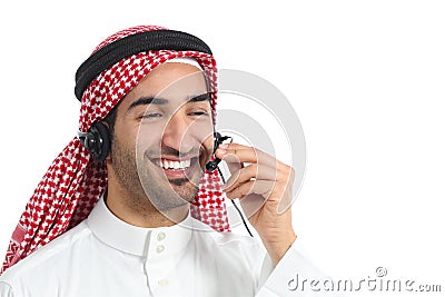 Happy arab saudi emirates telephone operator attending Stock Photo