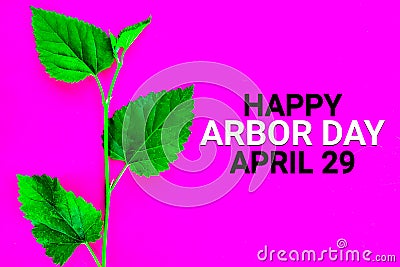 Happy Arbor Day April 29 with on pink background Stock Photo