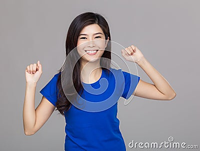 Happy asia woman celebrating Stock Photo