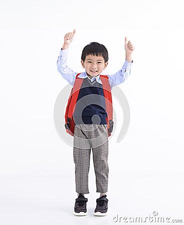 Happy asian boy wearing student backpack isolated on white Stock Photo