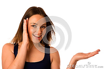 Happy asian caucasian woman holds hand in copyspace Stock Photo