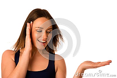 Happy asian caucasian woman holds hand in copyspace Stock Photo