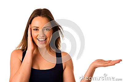 Happy asian caucasian woman holds hand in copyspace Stock Photo