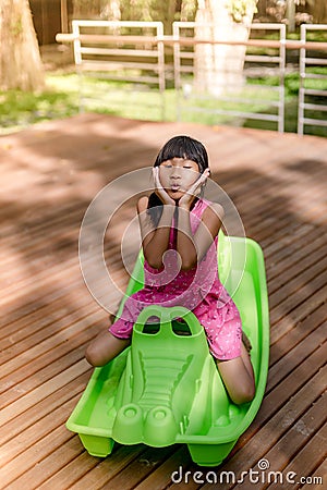 Happy Asian chidren playing at playground Stock Photo