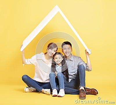Asian family in new house with roof concept Stock Photo