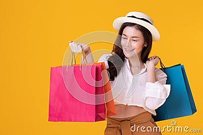 Happy asian woman holding shoppingbag with mid year sale Stock Photo