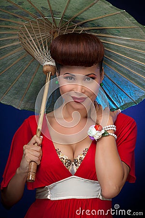 Happy asian woman with parasol Stock Photo