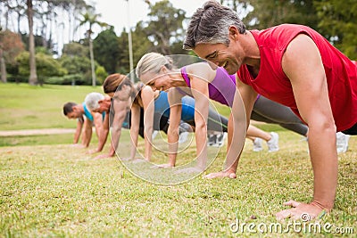 Happy athletic group training Stock Photo