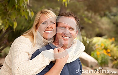 Happy Attractive Couple in the Park Stock Photo