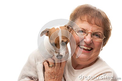 Happy Attractive Senior Woman with Puppy Stock Photo