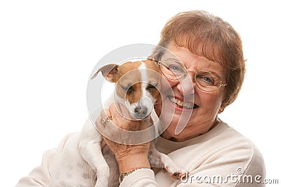 Happy Attractive Senior Woman with Puppy Stock Photo