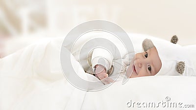 Happy Baby in Bed Stock Photo