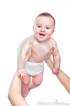 Happy baby being lifted up Stock Photo