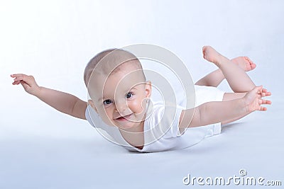 Happy baby flying on white Stock Photo