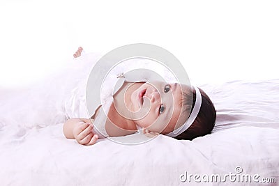 Happy baby wearing frock Stock Photo