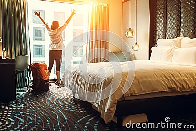 Happy backpacker traveller stay in high quality hotel Stock Photo