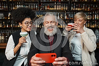 happy bearded man taking selfie on Stock Photo