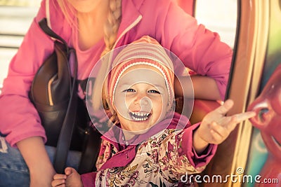 Happy beautiful child girl welcoming smile concept happy childhood welcoming in pink colors Stock Photo