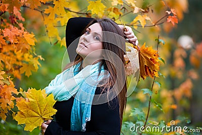 Happy beautiful woman in autumn, cute plus size model outdoors Stock Photo