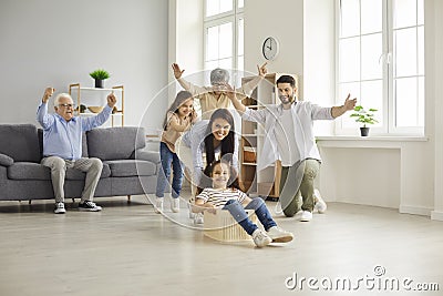 Happy big family with children have fun together at home playing and fooling around. Stock Photo