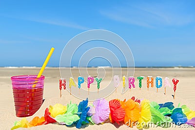 Happy birthday at the beach Stock Photo