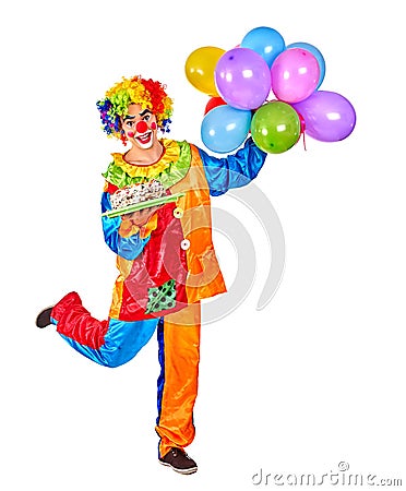 Happy birthday clown holding a bunch of balloons Stock Photo