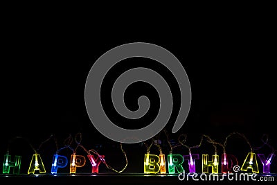 Happy birthday glowing letters background Stock Photo