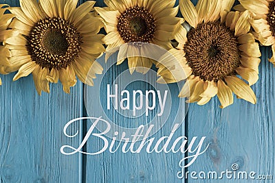 Happy Birthday. Birthday greeting card with sunflower flowers and a greeting lettering. Vintage card. Template for e-mail Stock Photo