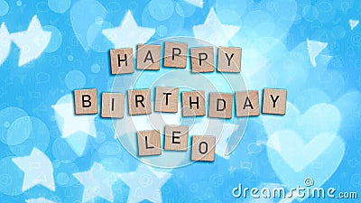 Happy Birthday Leo card with wooden tiles text Stock Photo