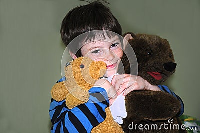 Happy boy with bears Stock Photo