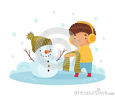 Happy Boy in Earmuffs Building Snowman and Dressing Him Up in Scarf and Hat Enjoying Winter Vector Illustration Vector Illustration