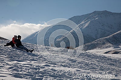 happy boy walking in sunny mountains children's clothing for the mountains close smiling portrait Stock Photo