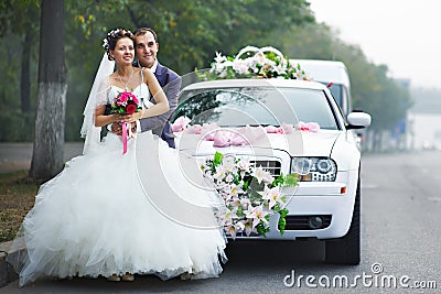 Happy bride and groom with lmo Stock Photo