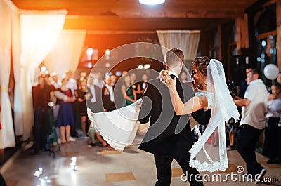 Happy bride and groom a their first dance, wedding